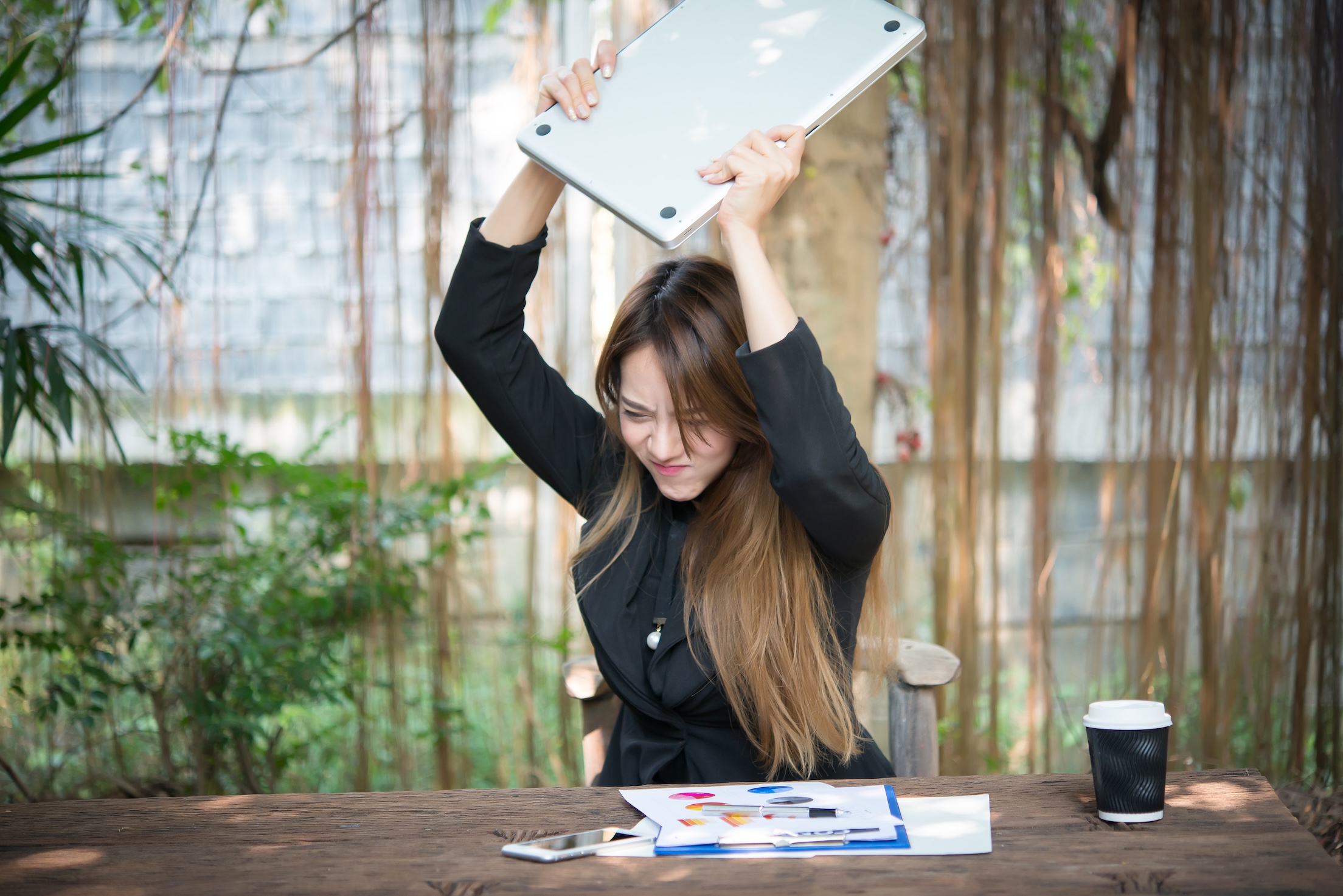 Business Woman Getting Crazy With Of Her Laptop.